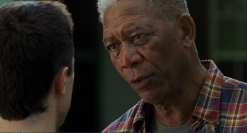Movie still from “Gone Baby Gone” (2007), directed by Ben Affleck – An older man is looking at a younger man; Close Up shot, Over the shoulder angle