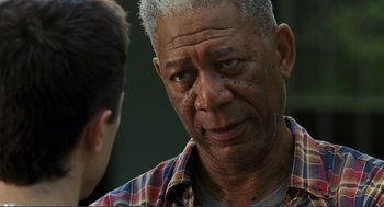 Movie still from “Gone Baby Gone” (2007), directed by Ben Affleck – An older man is looking at a younger man; Close Up shot, Over the shoulder angle