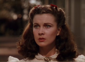 Movie still from “Gone with the Wind” (1939), directed by George Cukor – A person wearing a dress; Close Up shot, Low angle