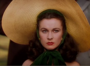 Movie still from “Gone with the Wind” (1939), directed by George Cukor – A person wearing a hat; Close Up shot, Overhead angle