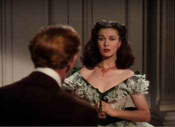 Movie still from “Gone with the Wind” (1939), directed by George Cukor – A man and a woman are looking at each other; Close Up shot, Over the shoulder angle