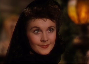Movie still from “Gone with the Wind” (1939), directed by George Cukor – A person wearing a veil; Close Up shot, High angle