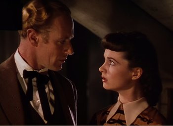 Movie still from “Gone with the Wind” (1939), directed by George Cukor – A man and a woman standing next to each other; Close Up shot, Over the shoulder angle