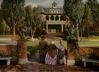 Movie still from “Gone with the Wind” (1939), directed by George Cukor – A painting of people walking down a brick path; Extreme Wide shot, Low angle