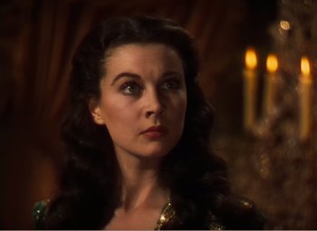 Movie still from “Gone with the Wind” (1939), directed by George Cukor – A person with long black hair; Close Up shot, Low angle