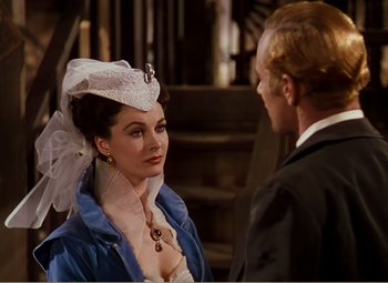 Movie still from “Gone with the Wind” (1939), directed by George Cukor – A man and a woman are standing next to each other; Close Up shot, Over the shoulder angle