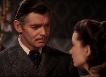 Movie still from “Gone with the Wind” (1939), directed by George Cukor – A man and a woman are talking to each other; Close Up shot, Over the shoulder angle
