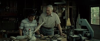 Movie still from “Gran Torino” (2008), directed by Clint Eastwood – Medium shot, Low angle