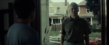 Movie still from “Gran Torino” (2008), directed by Clint Eastwood – Medium shot, Over the shoulder angle