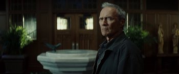 Movie still from “Gran Torino” (2008), directed by Clint Eastwood – Medium shot, Low angle