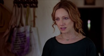 Movie still from “Grandma” (2015), directed by Paul Weitz – A person wearing a black shirt; Close Up shot, Over the shoulder angle