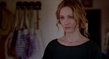 Movie still from “Grandma” (2015), directed by Paul Weitz – A person wearing a black shirt; Close Up shot, Over the shoulder angle