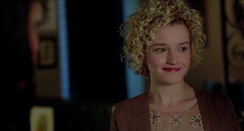 Movie still from “Grandma” (2015), directed by Paul Weitz – A person with curly blonde hair; Close Up shot, Over the shoulder angle