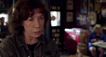 Movie still from “Grandma” (2015), directed by Paul Weitz – A person wearing a jean jacket; Close Up shot, Over the shoulder angle