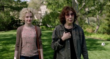 Movie still from “Grandma” (2015), directed by Paul Weitz – A woman and a young girl walking in a park; Medium shot, Over the shoulder angle