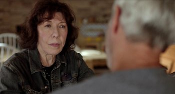 Movie still from “Grandma” (2015), directed by Paul Weitz – An older woman sitting in front of an older man; Close Up shot, Over the shoulder angle