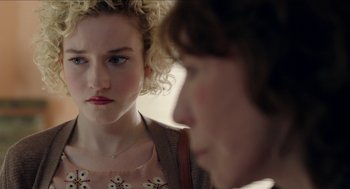 Movie still from “Grandma” (2015), directed by Paul Weitz – A woman and a man looking at one another; Close Up shot, Over the shoulder angle