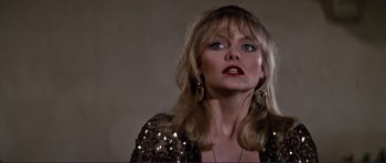 Movie still from “Grease 2” (1982), directed by Patricia Birch – A person with long hair; Close Up shot, Low angle