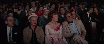 Movie still from “Grease 2” (1982), directed by Patricia Birch – A group of people sitting in front of each other; Medium shot, High angle