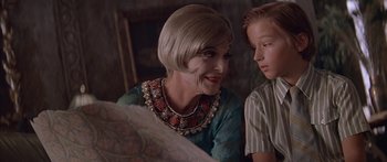 Movie still from “Great Expectations” (1998), directed by Alfonso Cuarón – An older woman and a young boy sitting next to each other; Close Up shot, Over the shoulder angle