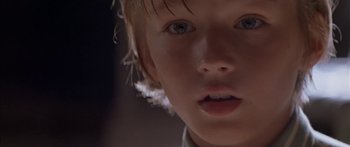 Movie still from “Great Expectations” (1998), directed by Alfonso Cuarón – A young boy's face; Close Up shot, Low angle