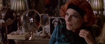 Movie still from “Great Expectations” (1998), directed by Alfonso Cuarón – An older woman sitting in front of a vanity mirror; Close Up shot, Over the shoulder angle