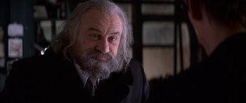Movie still from “Great Expectations” (1998), directed by Alfonso Cuarón – An old man with a beard and a mustache; Close Up shot, Low angle