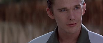 Movie still from “Great Expectations” (1998), directed by Alfonso Cuarón – A man's face in a white shirt; Close Up shot, Over the shoulder angle