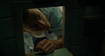 Movie still from “Great Freedom” (2021), directed by Sebastian Meise – A man looking at himself in a mirror; Close Up shot, High angle