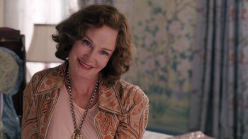 Movie still from “Grey Gardens” (2009), directed by Michael Sucsy – A person wearing a jacket; Close Up shot, Over the shoulder angle