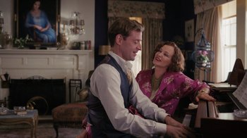 Movie still from “Grey Gardens” (2009), directed by Michael Sucsy – A man and a woman sitting at a piano; Medium shot, Over the shoulder angle