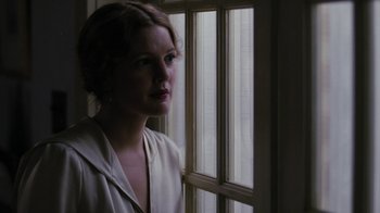 Movie still from “Grey Gardens” (2009), directed by Michael Sucsy – A woman standing in front of a window; Close Up shot, Low angle