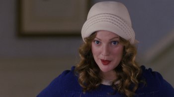 Movie still from “Grey Gardens” (2009), directed by Michael Sucsy – A person wearing a hat; Close Up shot, Over the shoulder angle