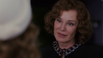 Movie still from “Grey Gardens” (2009), directed by Michael Sucsy – An older woman is looking at the camera; Close Up shot, Over the shoulder angle