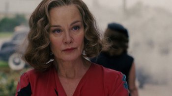 Movie still from “Grey Gardens” (2009), directed by Michael Sucsy – A person wearing a red shirt; Close Up shot, Low angle