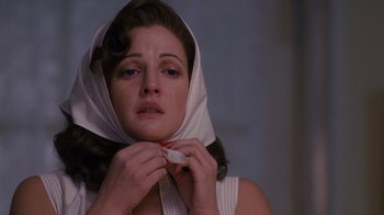 Movie still from “Grey Gardens” (2009), directed by Michael Sucsy – A woman with a white scarf around her neck; Close Up shot, Low angle