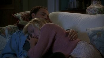 Movie still from “Grumpier Old Men” (1995), directed by Howard Deutch – A man and a woman sleeping on a couch; Medium shot, High angle