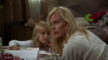 Movie still from “Grumpier Old Men” (1995), directed by Howard Deutch – A woman and a child sitting at a table; Close Up shot, Over the shoulder angle