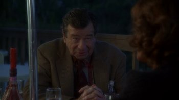 Movie still from “Grumpier Old Men” (1995), directed by Howard Deutch – An older man sitting at a table with a woman; Close Up shot, Over the shoulder angle