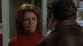 Movie still from “Grumpier Old Men” (1995), directed by Howard Deutch – An older woman looking at a younger man in the mirror; Close Up shot, Over the shoulder angle