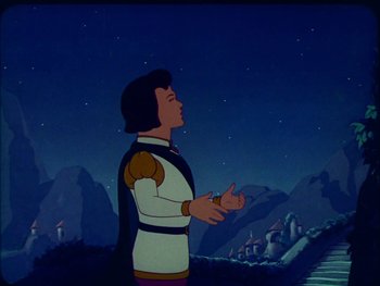 Movie still from “Gulliver's Travels” (1939), directed by William Henning – A man standing in front of a mountain at night; Medium shot, Low angle