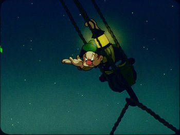 Movie still from “Gulliver's Travels” (1939), directed by William Henning – A cartoon of a person on a swing at night; Wide shot, Overhead angle