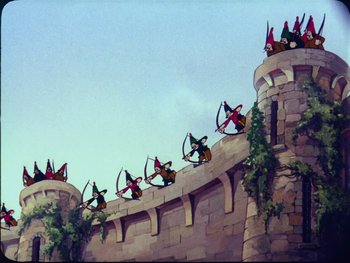 Movie still from “Gulliver's Travels” (1939), directed by William Henning – A group of people riding on the side of a wall; Wide shot, Low angle