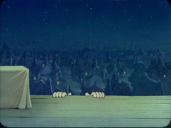 Movie still from “Gulliver's Travels” (1939), directed by William Henning – A scene of a stage with a crowd of people in the background; Wide shot, Low angle