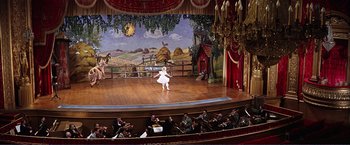 Movie still from “Gypsy” (1962), directed by Mervyn LeRoy – A little girl in a white dress on a stage; Extreme Wide shot, High angle