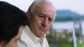 Movie still from “Hands of Stone” (2016), directed by Jonathan Jakubowicz – An old man with a beard and a white shirt; Close Up shot, Low angle