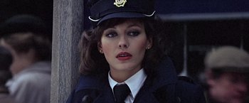 Movie still from “Hanover Street” (1979), directed by Peter Hyams – A woman wearing a uniform and a hat; Close Up shot, Low angle