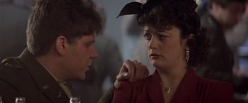 Movie still from “Hanover Street” (1979), directed by Peter Hyams – A man and a woman talking to each other; Close Up shot, Over the shoulder angle