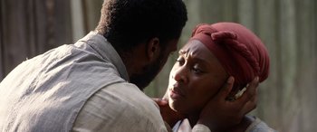Movie still from “Harriet” (2019), directed by Kasi Lemmons – A man and a woman looking at one another; Close Up shot, Over the shoulder angle