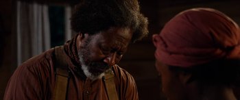 Movie still from “Harriet” (2019), directed by Kasi Lemmons – An older man is looking down at his face; Close Up shot, Over the shoulder angle